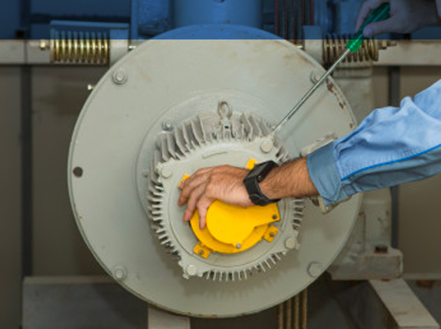 Technician working on a part
